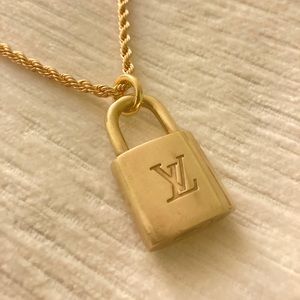 Vintage brass Louis Vuitton lock necklace